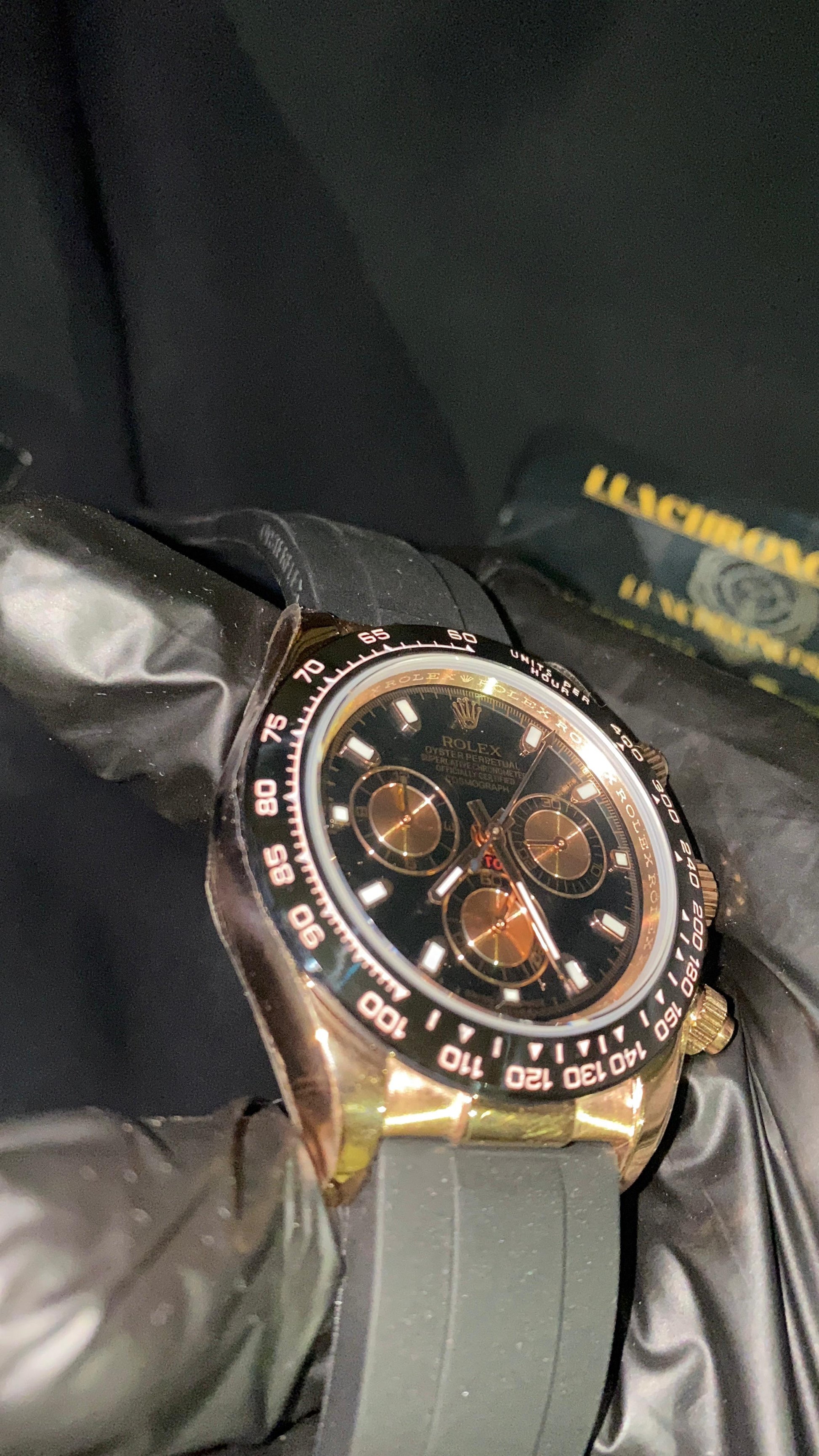 ROLEX COSMOGRAPH DAYTONA ROSE GOLD DIAL BLACK OYSTERFLEX