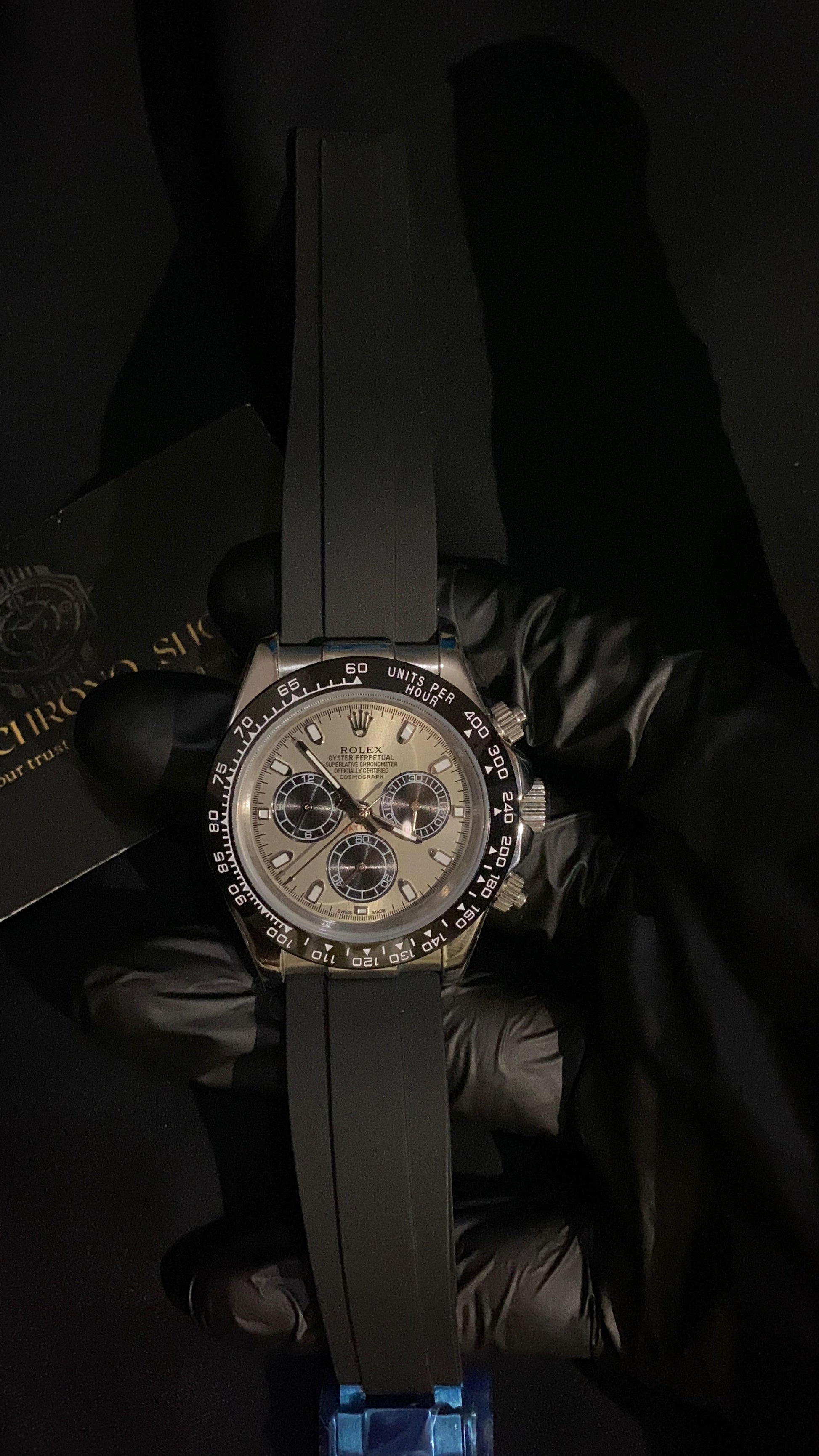 ROLEX COSMOGRAPH DAYTONA ROSE GOLD DIAL BLACK SUBDIALS OYSTERFLEX