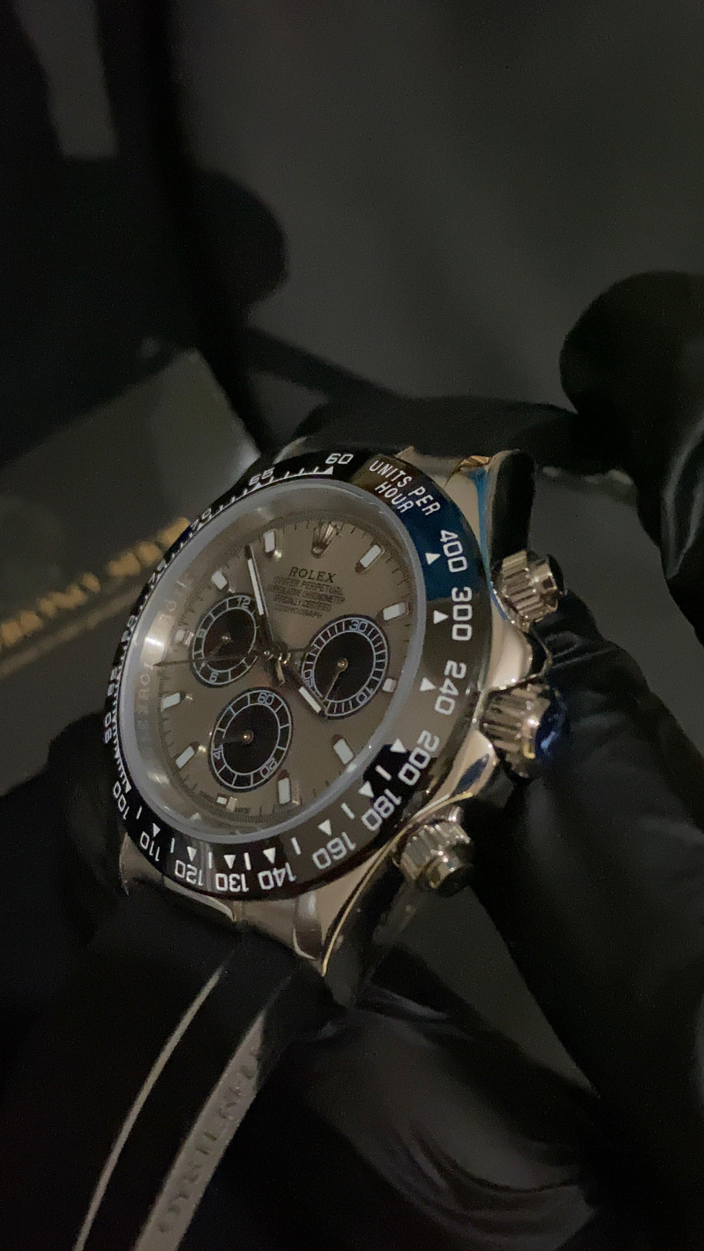 ROLEX COSMOGRAPH DAYTONA ROSE GOLD DIAL BLACK SUBDIALS OYSTERFLEX