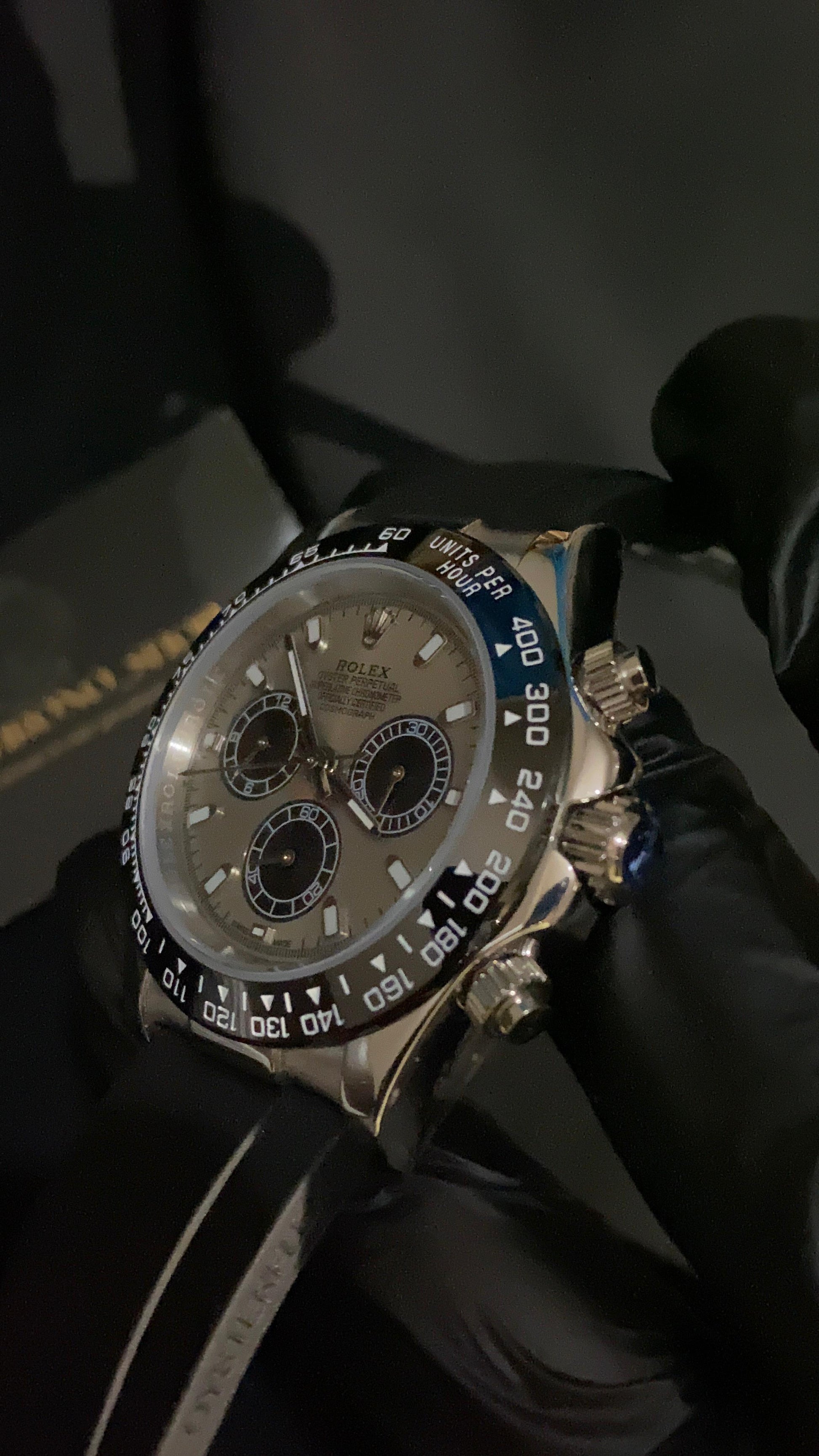 ROLEX COSMOGRAPH DAYTONA ROSE GOLD DIAL BLACK SUBDIALS OYSTERFLEX
