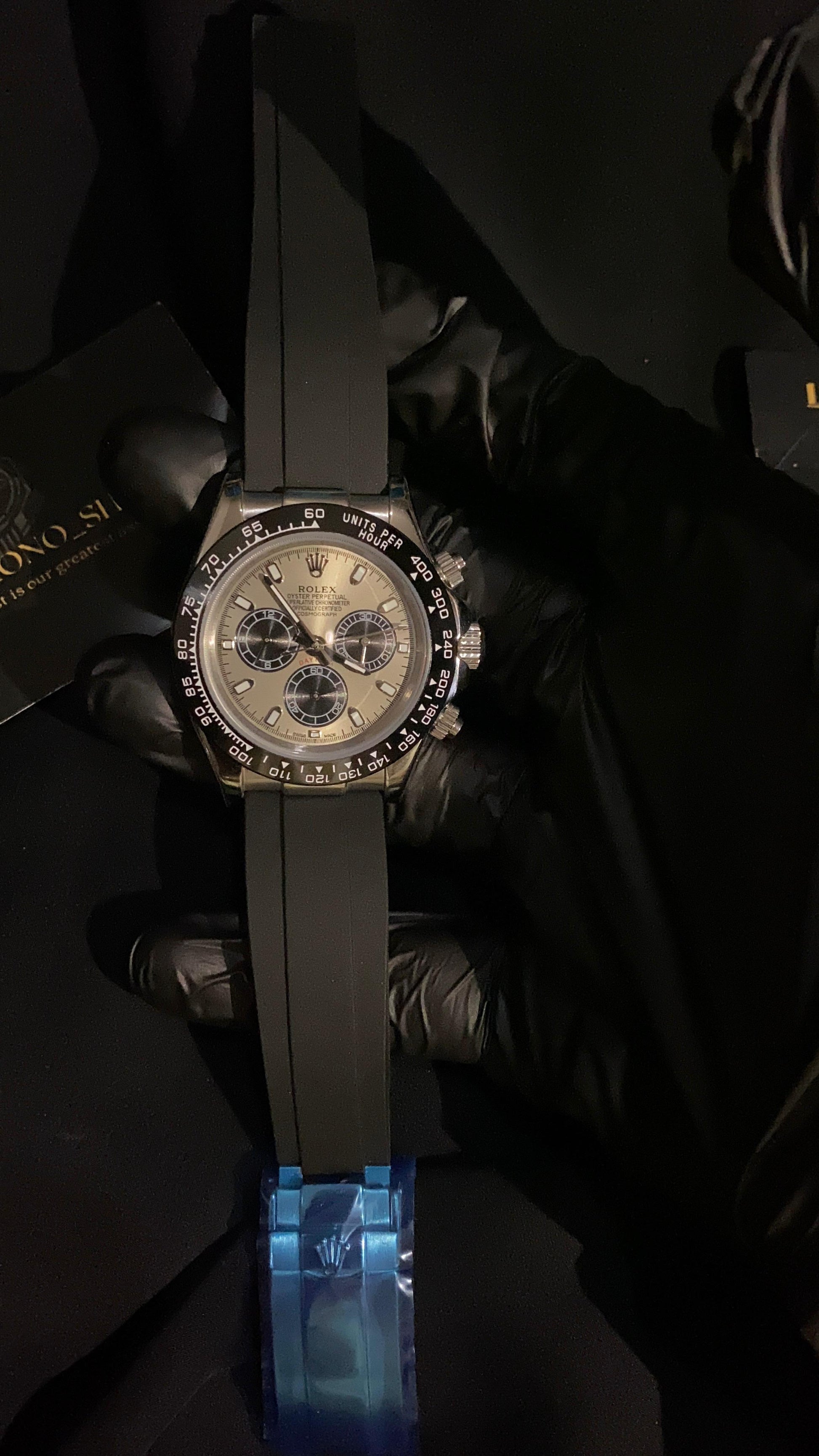 ROLEX COSMOGRAPH DAYTONA ROSE GOLD DIAL BLACK SUBDIALS OYSTERFLEX