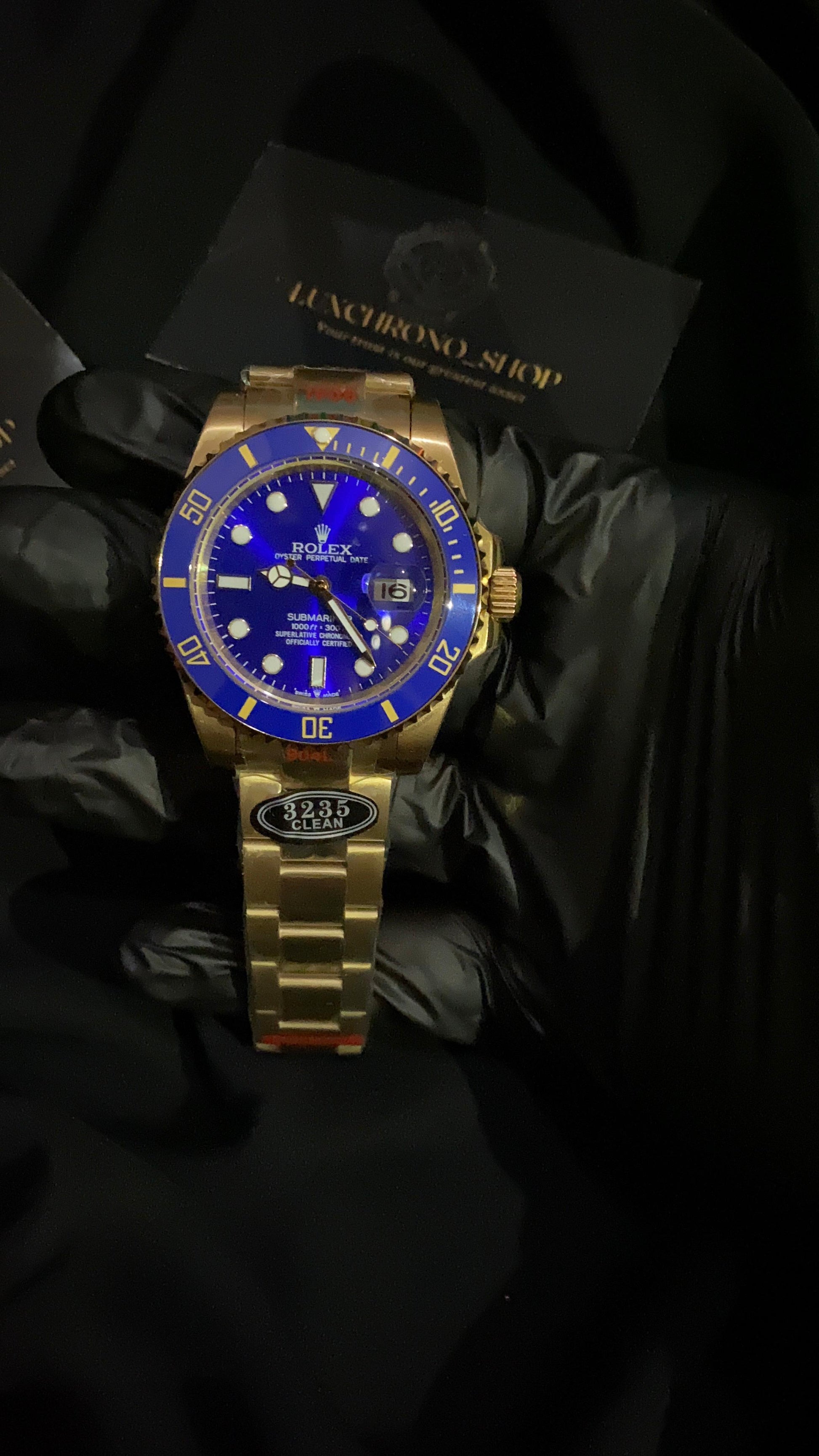 ROLEX SUMBMARINER DATE YELLOW GOLD & BLUE DIAL