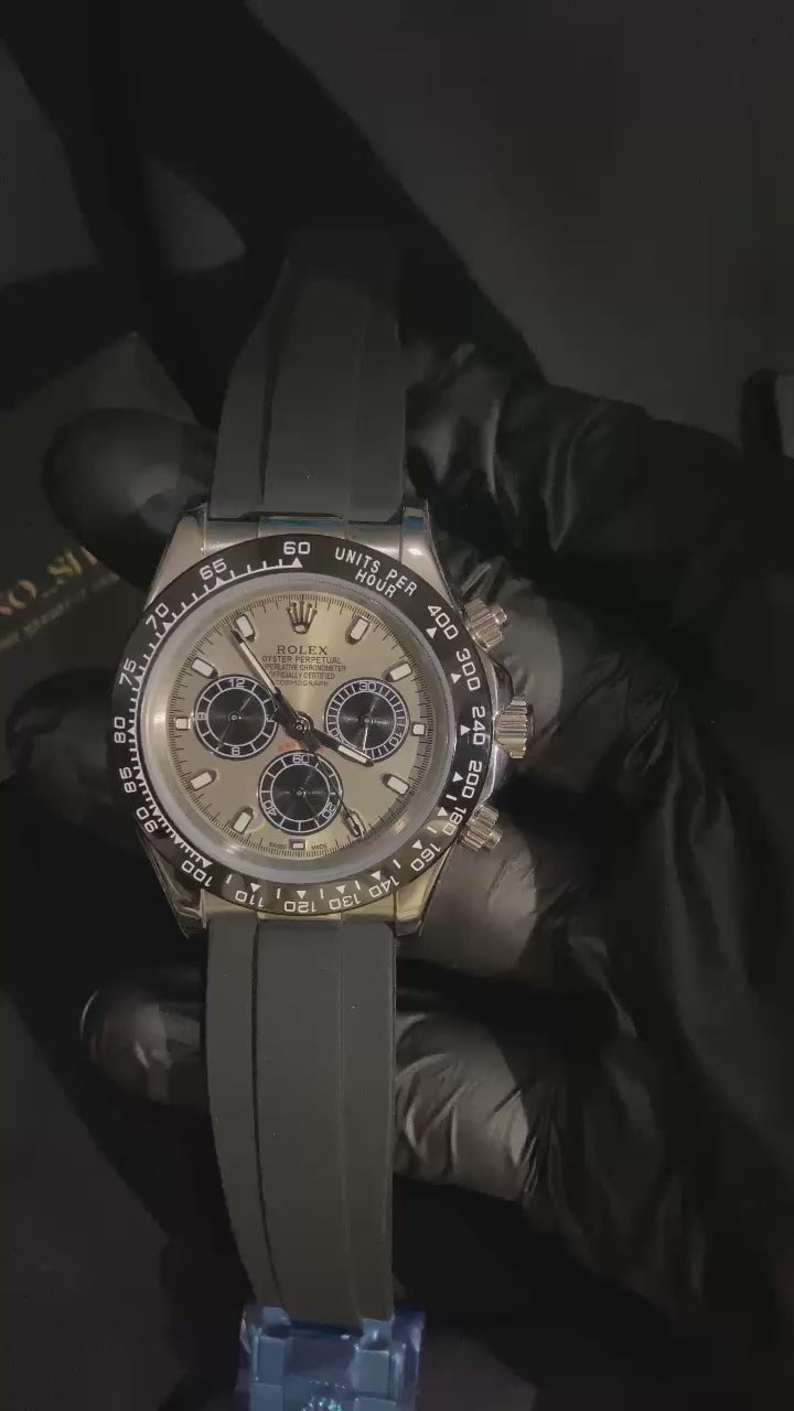 ROLEX COSMOGRAPH DAYTONA ROSE GOLD DIAL BLACK SUBDIALS OYSTERFLEX